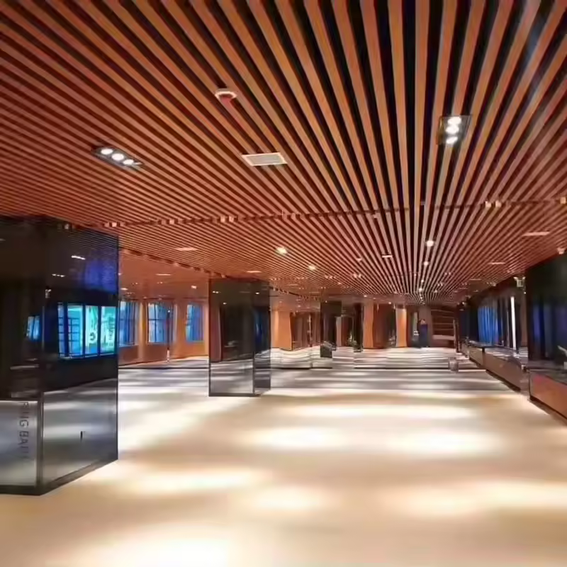 Factory Wholesale Wood Plastic Waterproof Ceiling WPC Wood Grain Ceiling 3D Design Office Slatted False Ceiling Interior Decoration