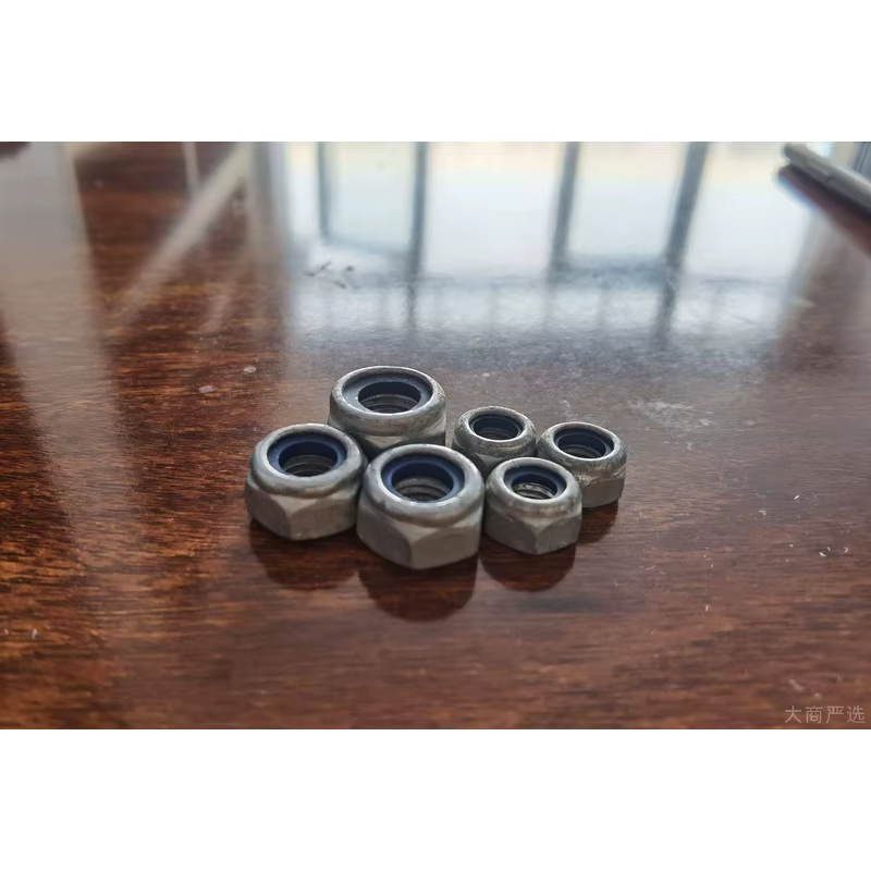Tuerca hexagonal con brida autoblocante con nylon DIN 6926 galvanizada antiaflojamiento