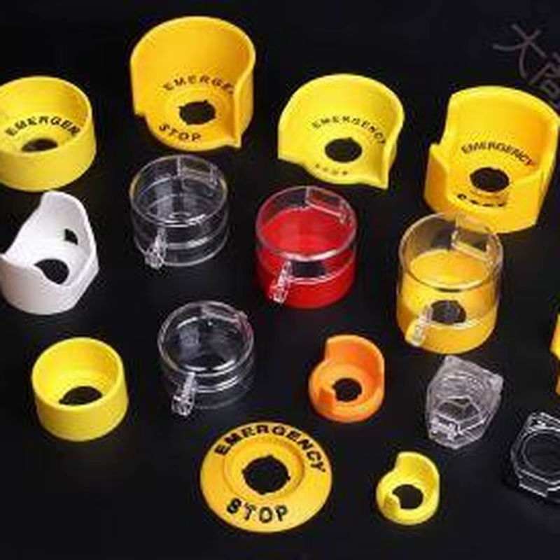 Emergency stop button protective cover