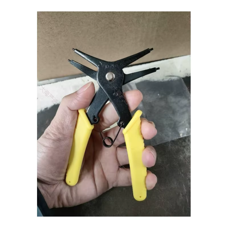 Dual-purpose retaining ring pliers